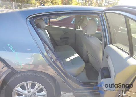 2010 Honda Insight Ex from USA, damaged, VIN JHMZE2H71AS040128